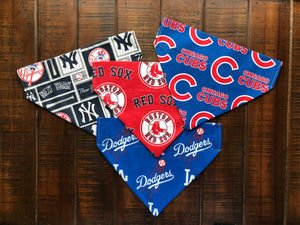 Over-the-collar dog bandanas won't bunch up or choke. Colorado Rockies fabric on one side, paw prints on the other.